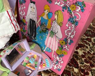 barbie case vintage with some clothing