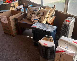 Air purifier, fans, space heaters, and throw pillows. 
