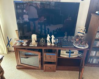 Tv and entertainment center. Bose sound system, dvd player and cd towers.
Various cd and cassettes. 