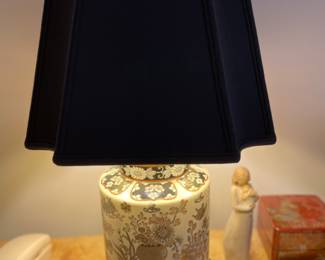 Asian style lap with black foil lined lamp shade $250