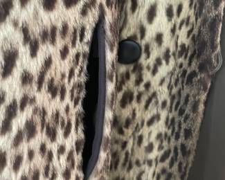 Leopard pelt swing coat with mink collar, 3/4 length sleeves, pockets. These fur coats from a well known local estate are back on the market! Ferris Furs, Pensacola, Fl original label.   Contact me for prices on the fur coats