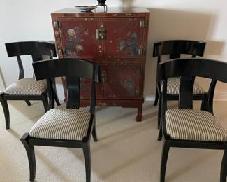 Eight (8) black lacquered dining chairs $800