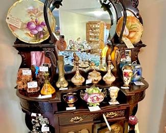 A Beautiful piece, French Etagere, with mirror, display shelves, drawers, glass front cabinets (velvet lined inside). Shown displayed porcelain hand-painted plates, soap stone vases, Weller Vases, Dresser Set, and misc. other collectibles