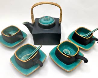 Vintage Vietnamese Ceramic Tea Set With Tea Pot & 4 Cups With Saucers & Spoons
Lot #: 74
