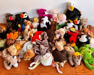 Over 40 Beanie Babies Stuffed Animals With Yellow Stars On Tags
Lot #: 153