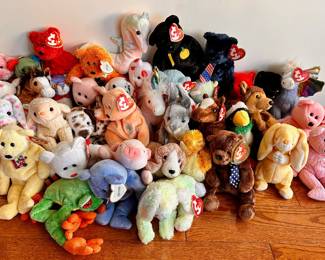 Over 40 Beanie Babies Stuffed Animals: No Star, Birthday Cake, Yellow & Hologram Stars On Tags
Lot #: 26
