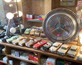 Hub Cap and Plastic Model Cars