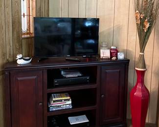 Corner Tv Cabinet 
Samsung TV w/ remote