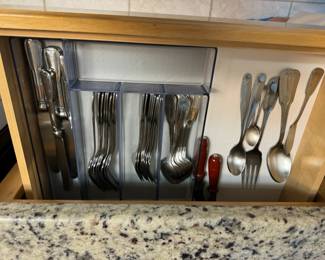 Two sets of silverware.