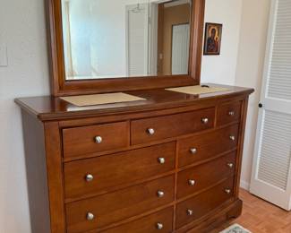 Light cherry tall dresser. Beautiful condition.
