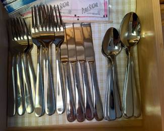 Two sets of silverware.