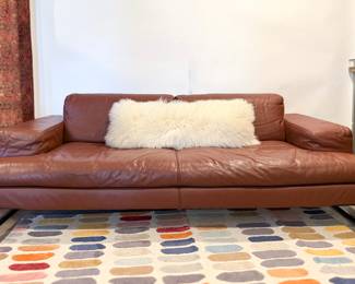 Custom, made in Italy, reclining sofa in supple Italian leather. 