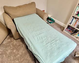 Tan pull out sleeper love seat