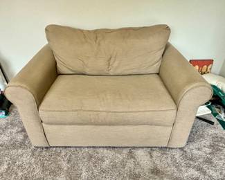 Tan pull out sleeper love seat