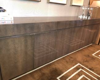 Custom made Gomillion Furniture Co., Cleveland-long lacquered sideboard 120" long x 20" deep x 36" tall $1,000. Some small nicks here & there and minor surface abrasions.