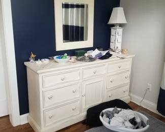 Cottage chic white dresser; wall mirror; table lamp