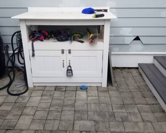 Paving stones; white all weather storage & work station