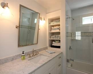 Updated bath vanity; vanity lights (sorry -owner keeping this vanity mirror)