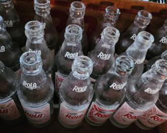 Rola Cola bottles and Case