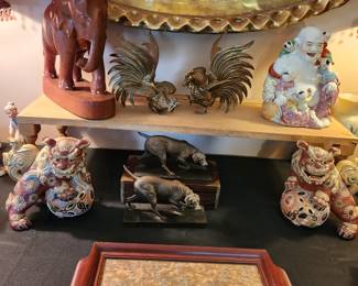 Pr. Foo Dogs Japan
Pr. Bronze Hunting Dogs
Brass fighting cocks
Carved Elephant
Buda