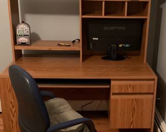 Office desk, swivel desk chair, flatscreen television
