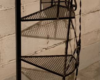 Metal spiral staircase plant stand