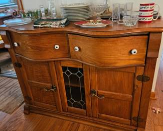 Beautiful wood, leaded glass and porcelain pulls sideboard