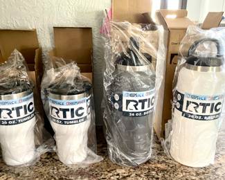 New in box RTIC Jugs • Holds the Ice and Heat