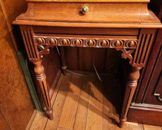 Carved detail antique side table w drawer