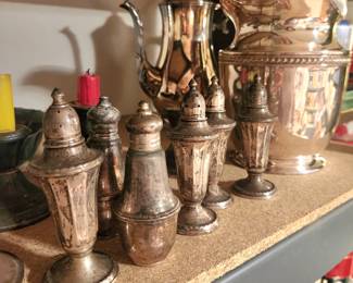 Silver salt and pepper shakers, and candle holders and serveware 