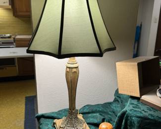 Matching buffet lamps with pale turquoise lampshades.