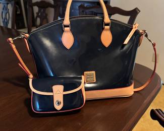 Dooney and Bourke 'dome bag' and wristlet.