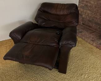 Almost new chocolate leather lift chair. Works great!