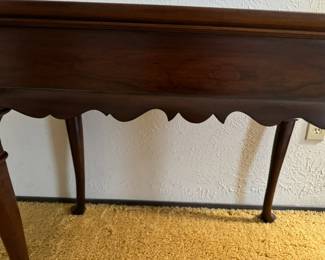 Ethan Allen Georgian Court Queen Anne cherry wood tea table with pull out shelves.