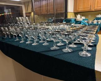 Large collection of Sheffield by Fostoria water, white wine, red wine and dessert/ parfait crystal glasses. These have an elegant silver rim.