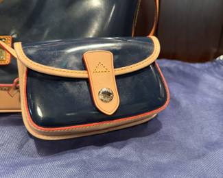 Dooney and Bourke 'dome bag' and wristlet.