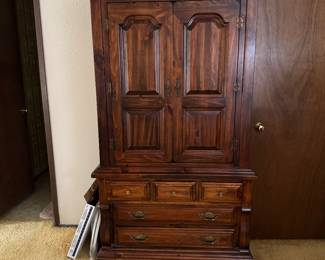 Wardrobe with shelves/ drawers.