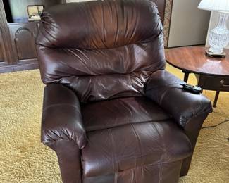 Almost new chocolate leather lift chair. Works great!