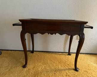 Ethan Allen Georgian Court Queen Anne cherry wood tea table with pull out shelves.