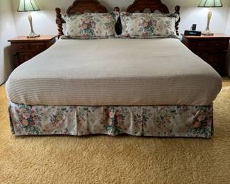 King sized headboard with mattress and box springs.