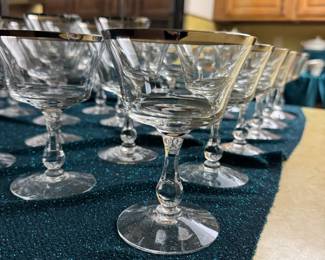 Large collection of Sheffield by Fostoria water, white wine, red wine and dessert/ parfait crystal glasses. These have an elegant silver rim.