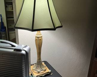 Matching buffet lamps with pale turquoise lampshades.