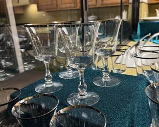 Large collection of Sheffield by Fostoria water, white wine, red wine and dessert/ parfait crystal glasses. These have an elegant silver rim.