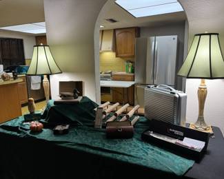 Matching buffet lamps with pale turquoise lampshades.