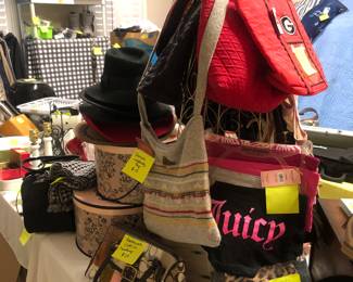 Lots of name brand purses, wallets and sunglasses holders.  Plenty of Georgia bags. 