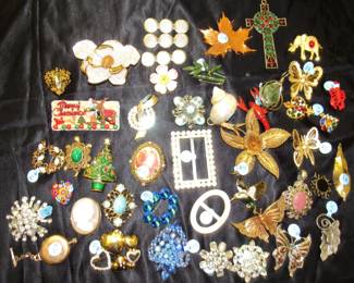 There is a lot of vintage jewelry here.