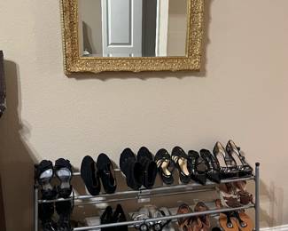 A lot of lady's shoes, mirror