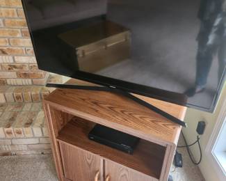 Media Cabinet and Samsung Flat Screen TV.