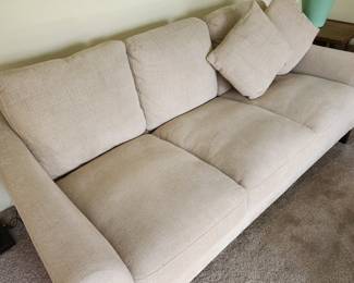 Neutral Sofa with Decorator Pillows. 