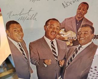 Actually signed by the Mills Brothers. 